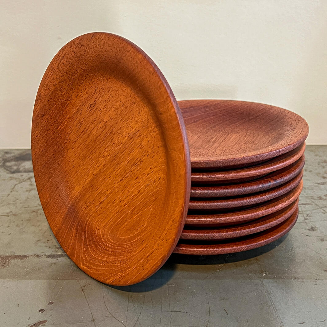 Eight mahogany plates